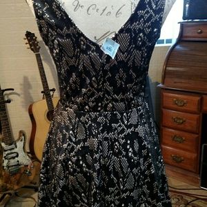 Lined black lace dress.